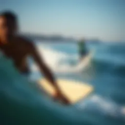 Surfers catching waves at Santa Monica beach