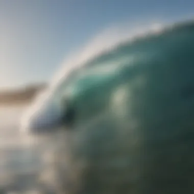 A surfer riding a powerful wave at a famous California beach