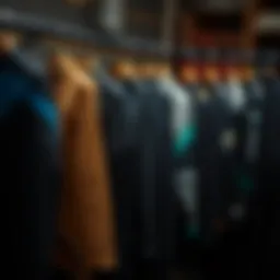 Different wetsuit thicknesses displayed on a rack