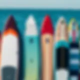 A selection of paddle boards of various sizes displayed side by side