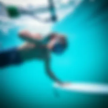 Underwater Training for Enhanced Respiratory Efficiency Surfer performing underwater exercises to improve lung strength