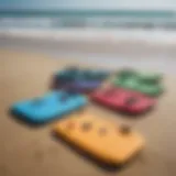 Colorful boogie boards lined up on a sandy beach