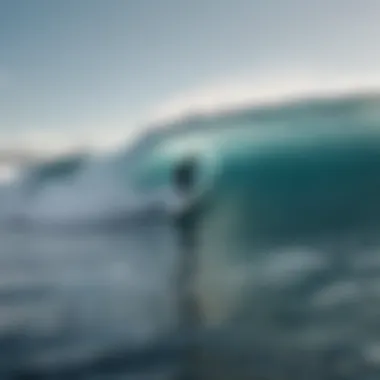 A surfer navigating through the powerful swells at Cold Hawaii