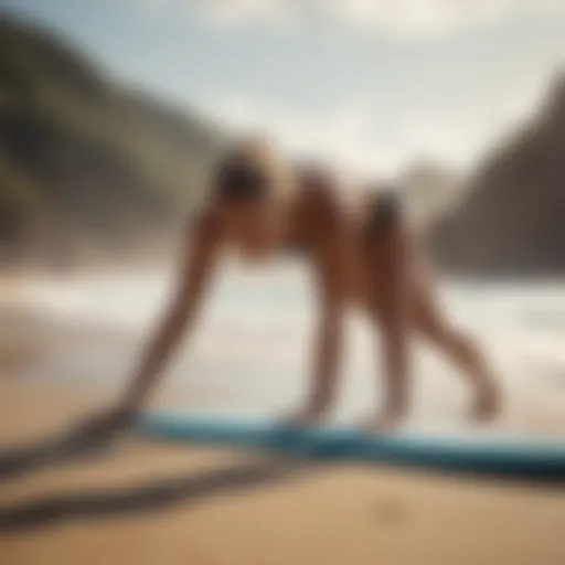 A surfer practicing downward dog yoga pose on the beach