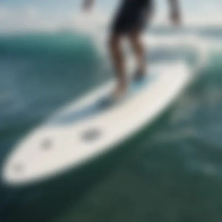 A sleek efoil surfboard gliding over clear waters