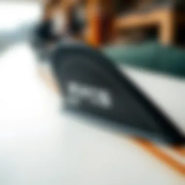 FCS Fin Plug Installed in Surfboard A close-up of an FCS fin plug installed in a surfboard.