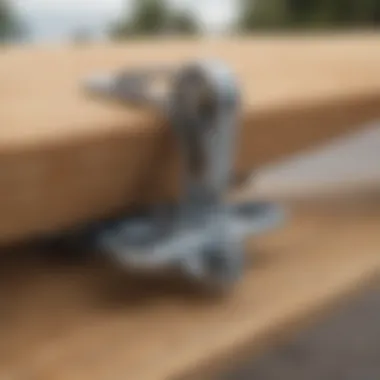 Close-up of the hinge mechanism on a foldable longboard