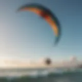 A kite soaring high above the ocean during a kitesurfing session