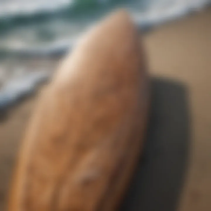 Close-up of a surfboard adorned with traditional Hawaiian designs