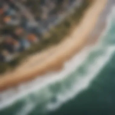 An aerial shot of Nelscott Beach showcasing the coastline and surf breaks.