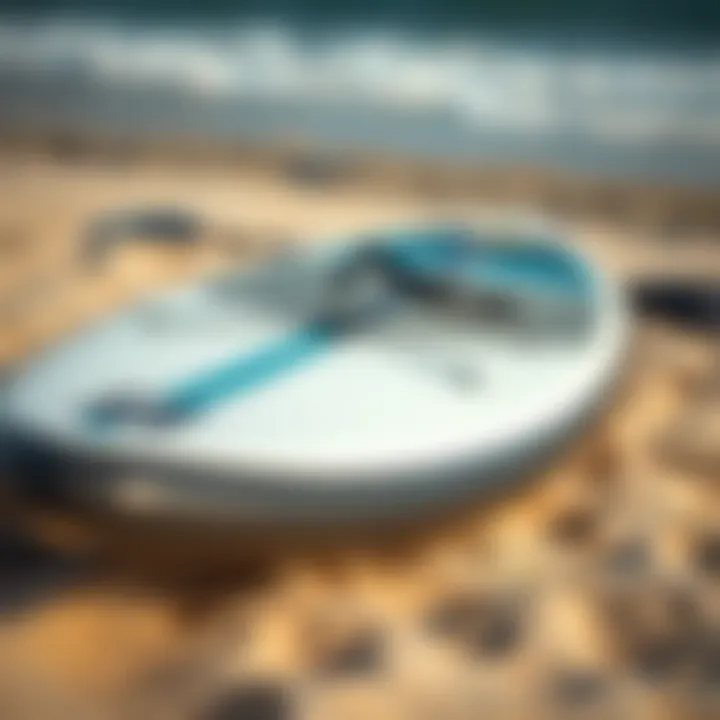Paddle Board Gear on Sandy Beach A close-up of paddle board gear laid out on a sandy beach