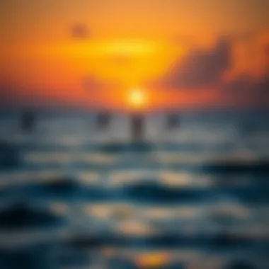 Sunset Over Ocean with Paddle Boarders A picturesque sunset over the ocean with paddle boarders in the distance