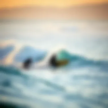 A scenic view of surfers riding waves at a California beach