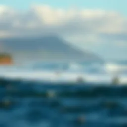 Breathtaking view of Reunion Island's coastline with surfers riding the waves