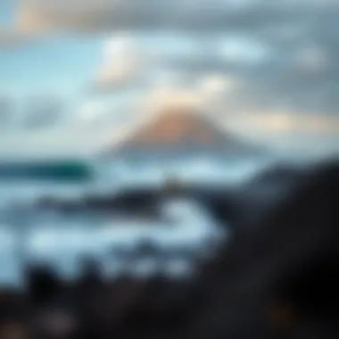 The unique volcanic landscape of Reunion Island providing the backdrop for surfing