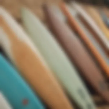 Close-up of surfboards lined up on the beach, reflecting local styles and designs.