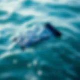 Waterproof key pouch floating on ocean surface