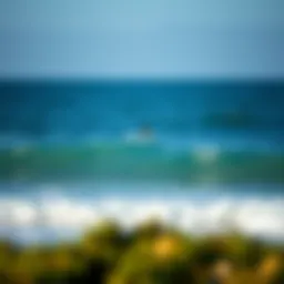 A serene coastal view with waves crashing gently against the shore