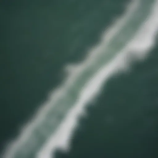 Aerial view of surfers riding waves in South Padre