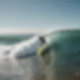 A surfer catching a wave at Ocean Beach