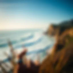 A breathtaking view of San Sebastian's coastline with surfers riding waves.