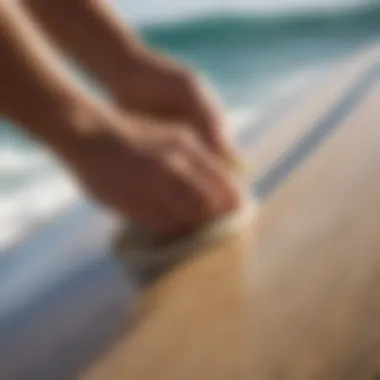 Close-up of the SurfPrep sander in action on a surfboard