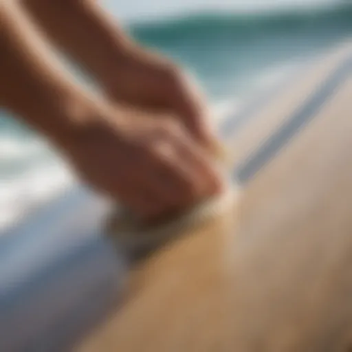 Close-up of the SurfPrep sander in action on a surfboard