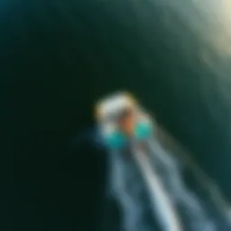 An aerial view of a wake surfer gliding on the water