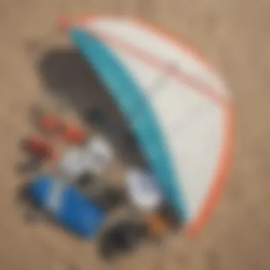 Close-up view of wind surfing equipment laid out on the beach