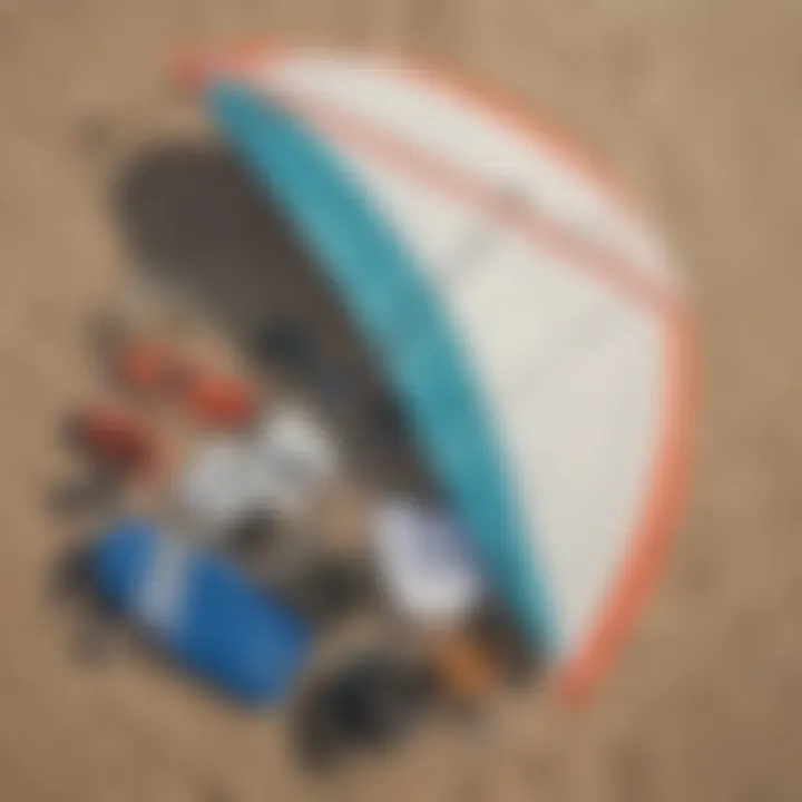 Close-up view of wind surfing equipment laid out on the beach