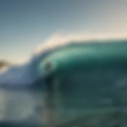 A surfer riding a majestic wave at California's coastline