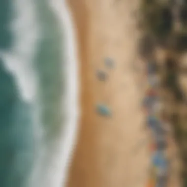 An aerial view of a surf competition taking place on a pristine beach