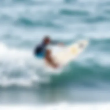 Surfer riding on a Catch Surf funboard in action