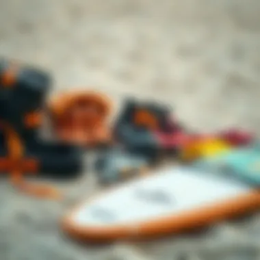 Essential Surfing Gear An array of essential surfing gear laid out on a sandy beach, highlighting the importance of equipment in surfing.