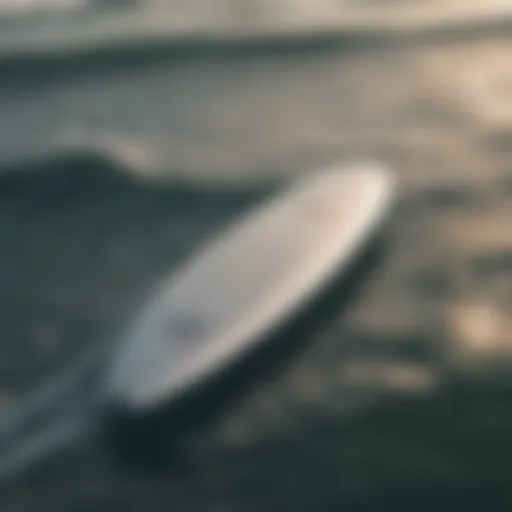 A sleek foil surfboard gliding effortlessly over water