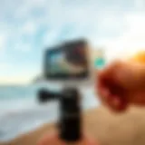 Close-up of a GoPro handheld mount in action on the beach.