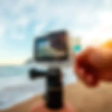 Close-up of a GoPro handheld mount in action on the beach.