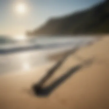 A serene beach scene highlighting the Moonsniper surf rod resting on the sand.