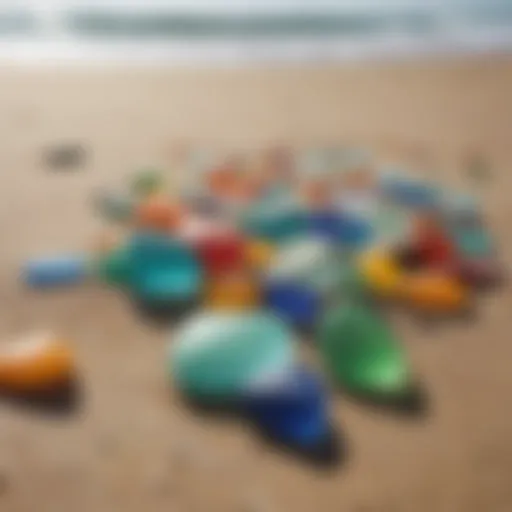 A close-up view of colorful beach glass pieces scattered on the sand