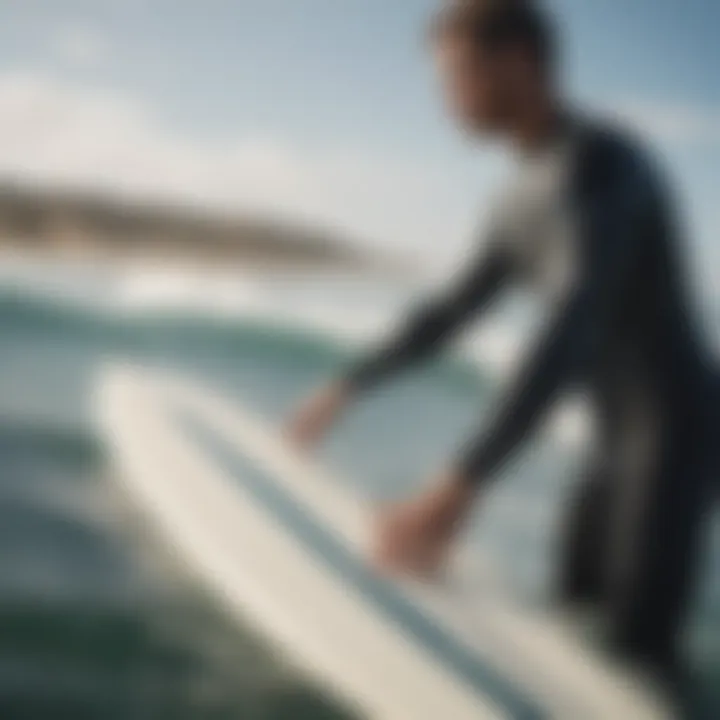 Surfer using FCS surfboard straps in action on the waves.