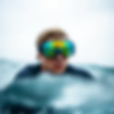Surfer wearing Kurtis goggles in varied conditions