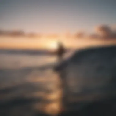 A silhouette of a surfer preparing to ride a wave at sunset.