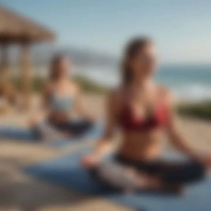 Guests enjoying a yoga session on the terrace overlooking the ocean