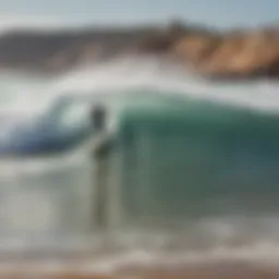 Surfer riding a wave at Taghazout beach