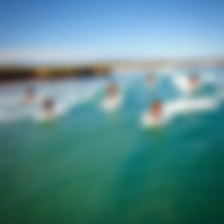 An aerial view of surfers enjoying motorized wave boards on a beach