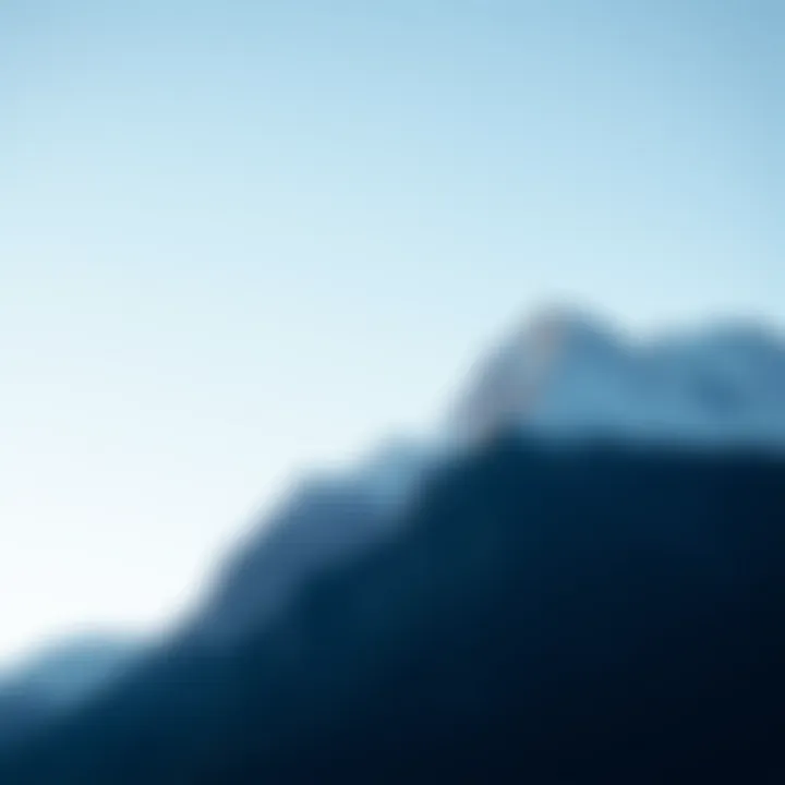 A serene landscape with mountains and a clear blue sky