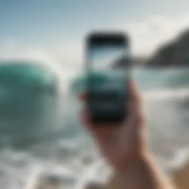 Surfer checking the ocean conditions with a phone