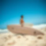 Surfer practicing warm-up exercises on the beach