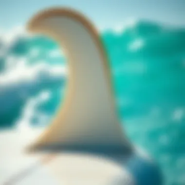 Understanding Surfboard Fins and Tail Design Close-up of surfboard fins and tail design
