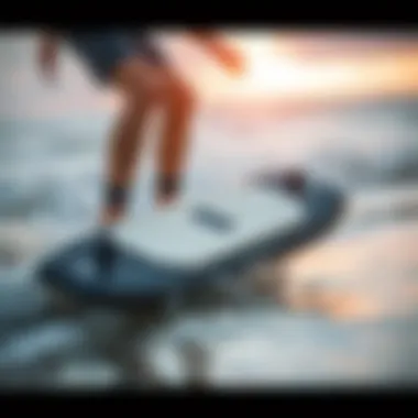A person using a skimboard with a front traction pad on the beach